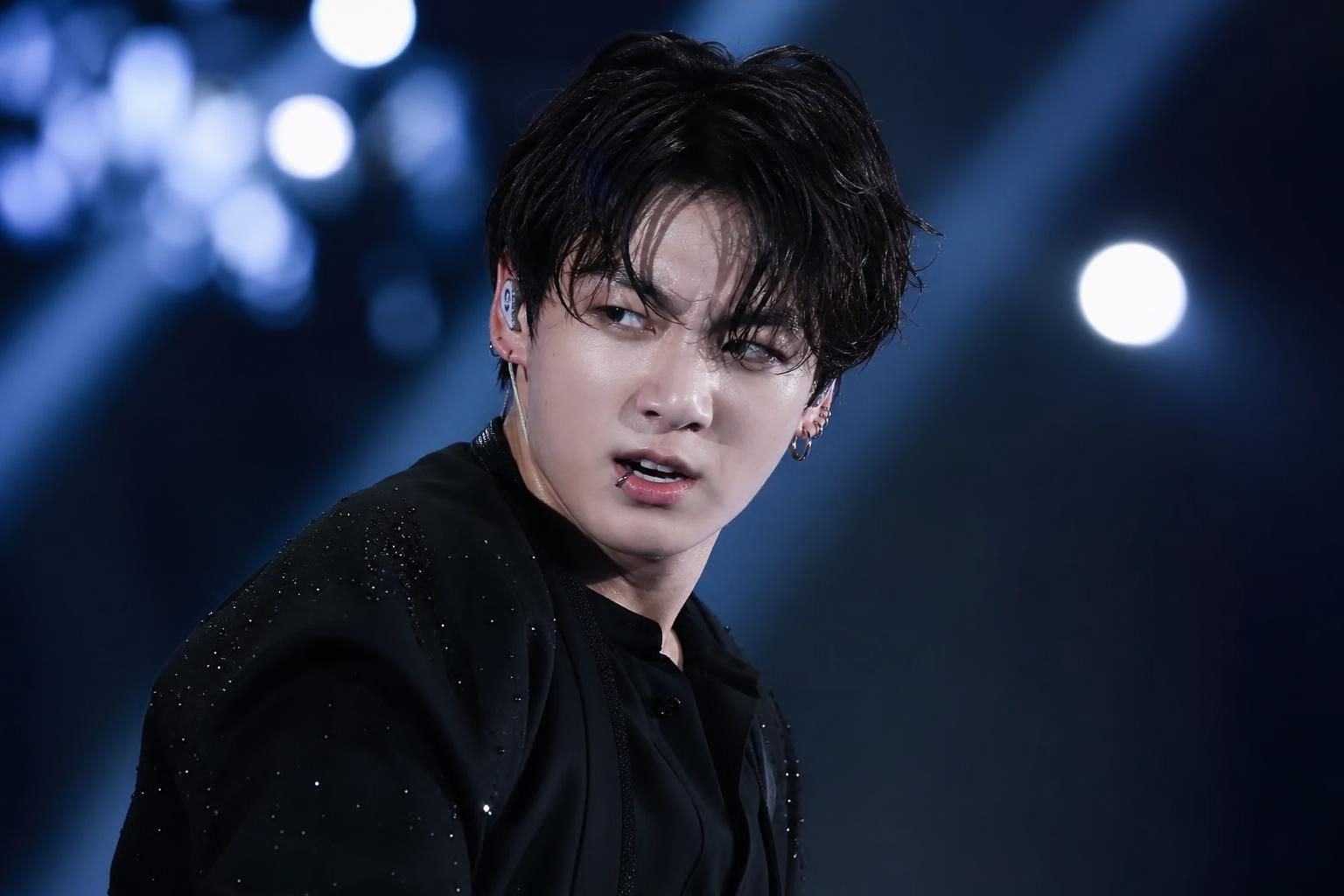 Jungkook expression Image showing the article's key context - Many fans linked the “mad” look to the broader issues surroundi...