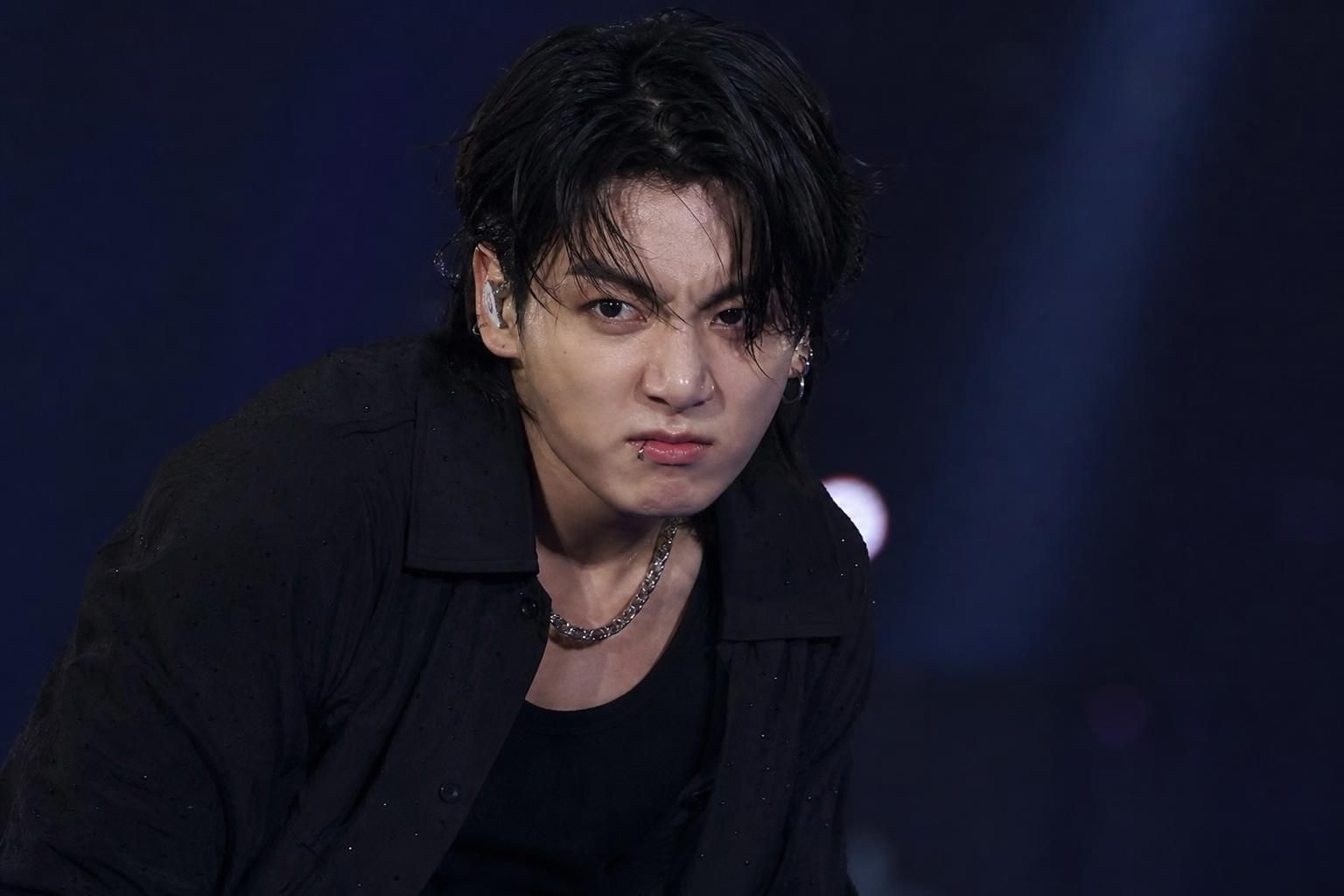 Jungkook expression Image explaining the article's impact and background - That tension—between performer intent and audience...