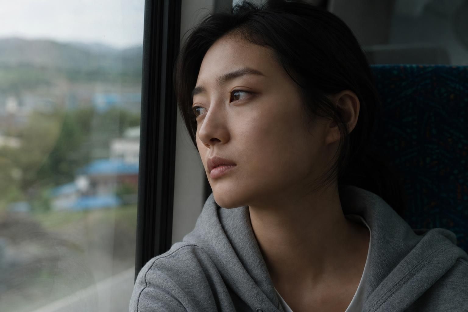 defector film Image explaining the article's impact and background - Kim Min Ha plays Hye Seon, and the poster messaging impl...