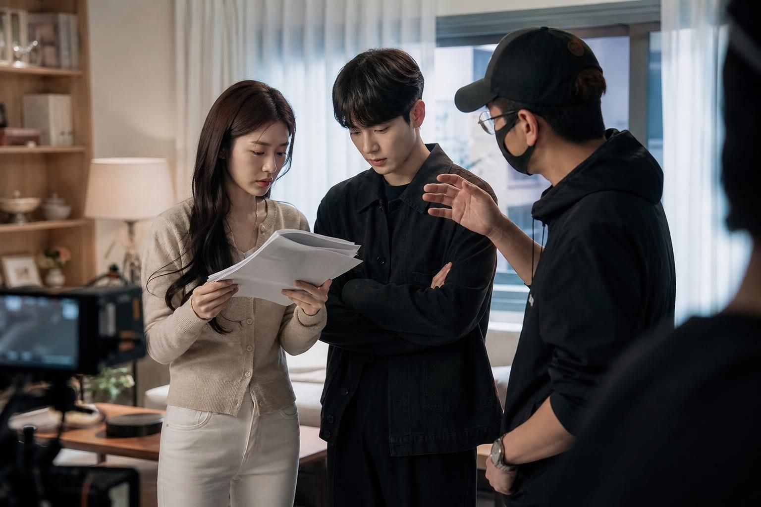 K-drama set Image explaining the article's impact and background - At least two narratives are colliding here. One perspectiv...