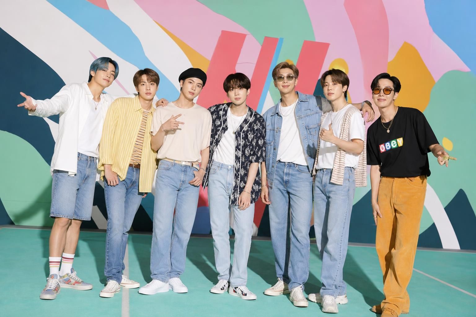 BTS Dynamite Image explaining the article's impact and background - The timing also matters: BTS has continued to release mus...
