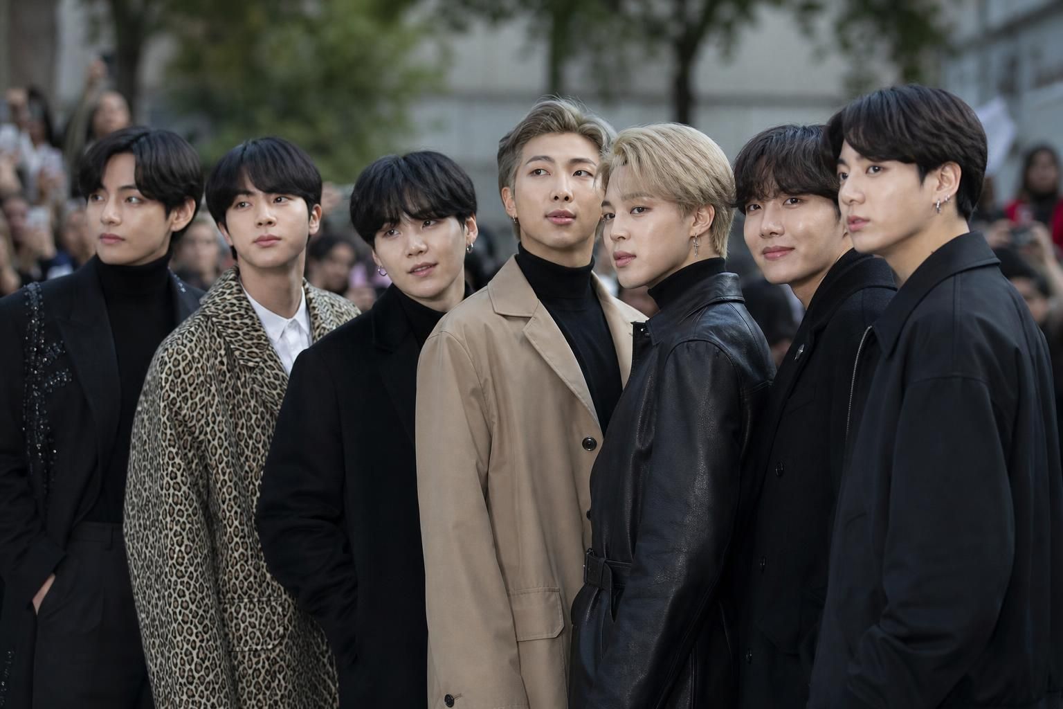 BTS Getty photos Image showing the article's key context - As described by Koreaboo, Jimin was the first member linked to the...