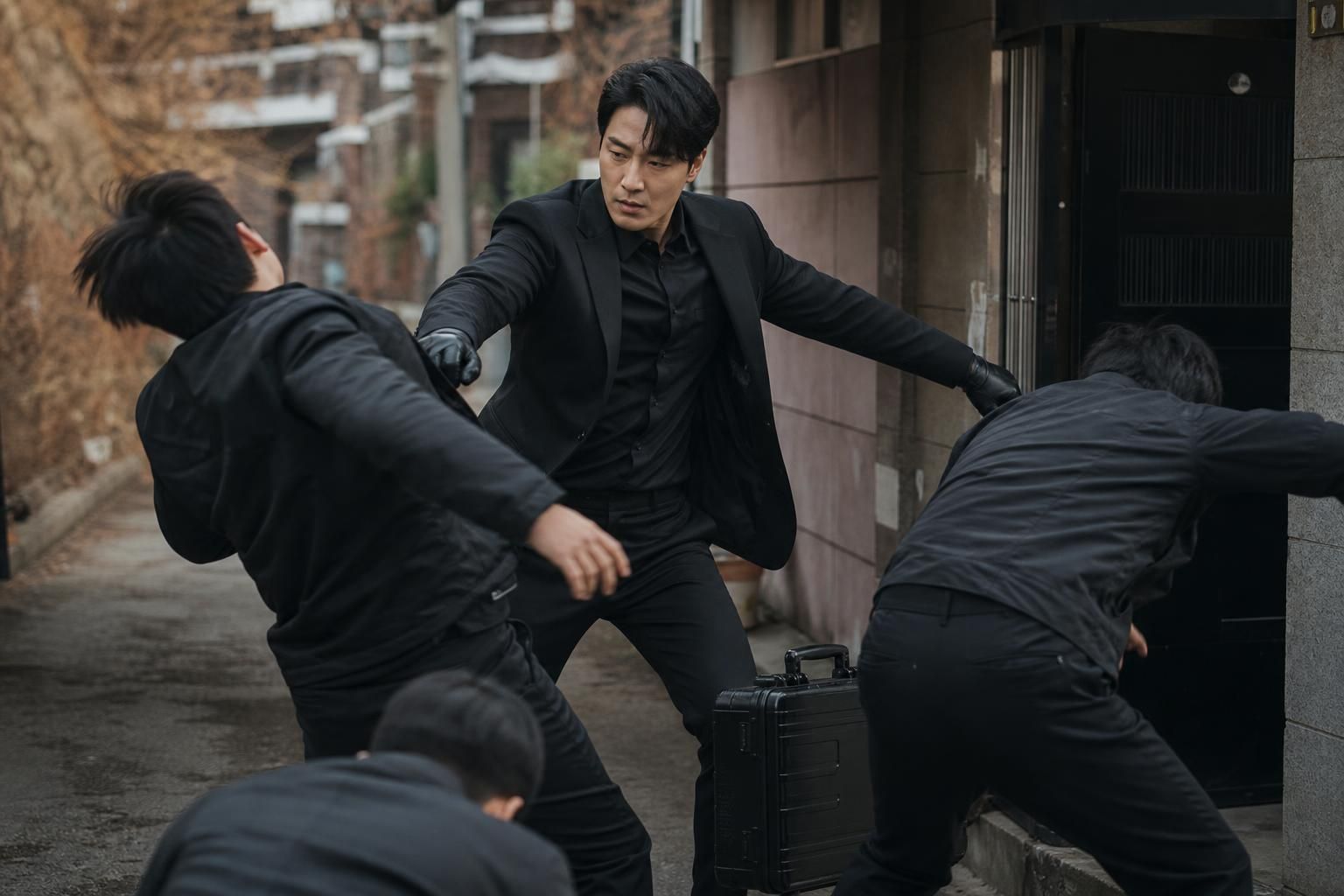 briefcase action Image showing the article's key context - In newly released stills for episode two, Manager Kim appears in f...