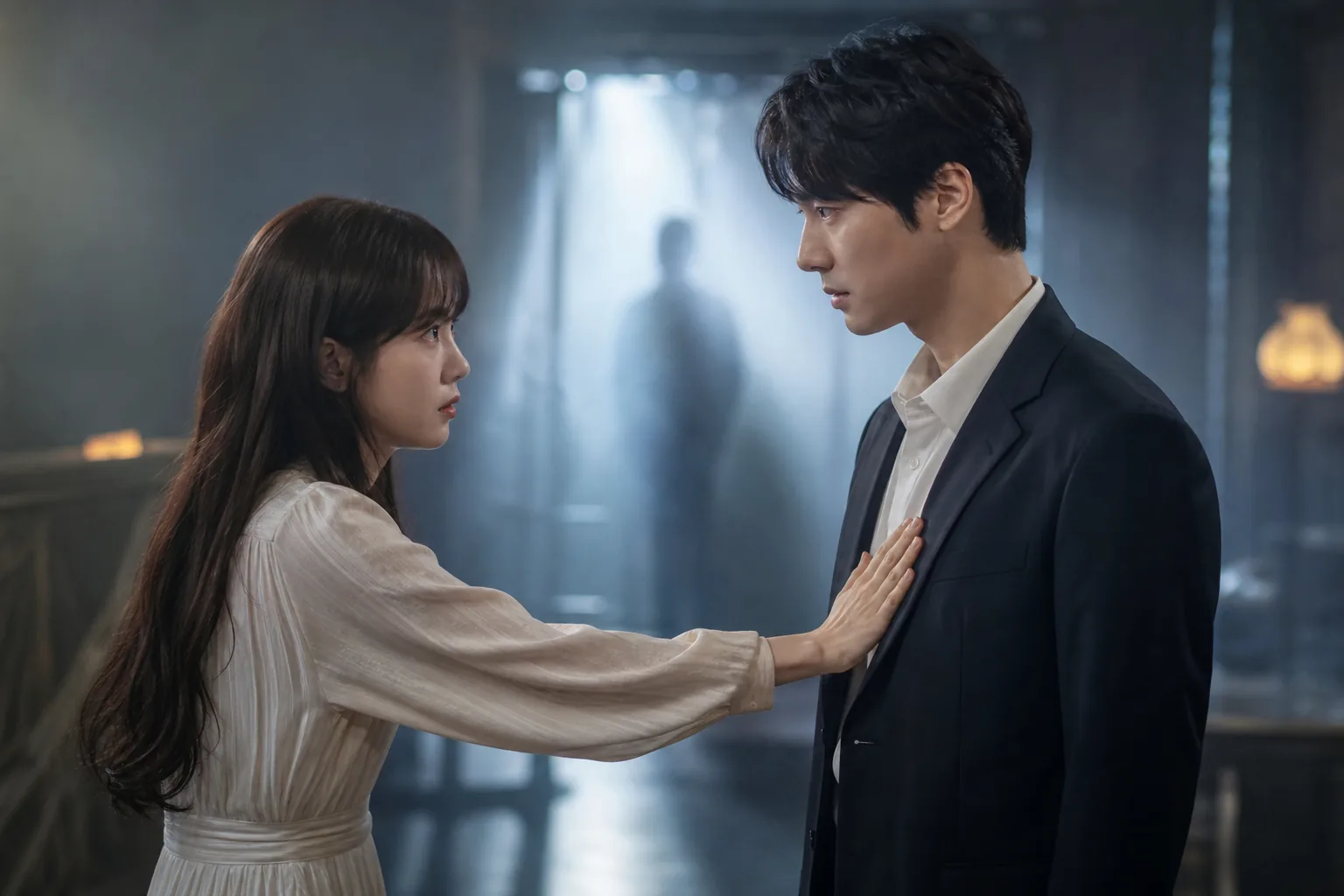 Occult romance drama investigators reviewing clues in a modern Korean setting