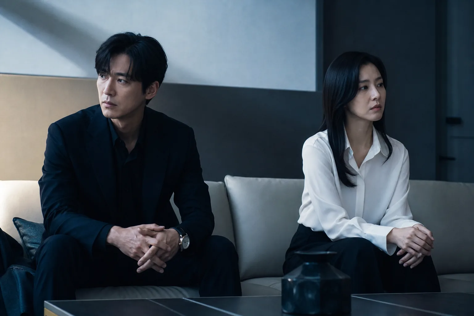Korean drama production team reviewing thriller poster images