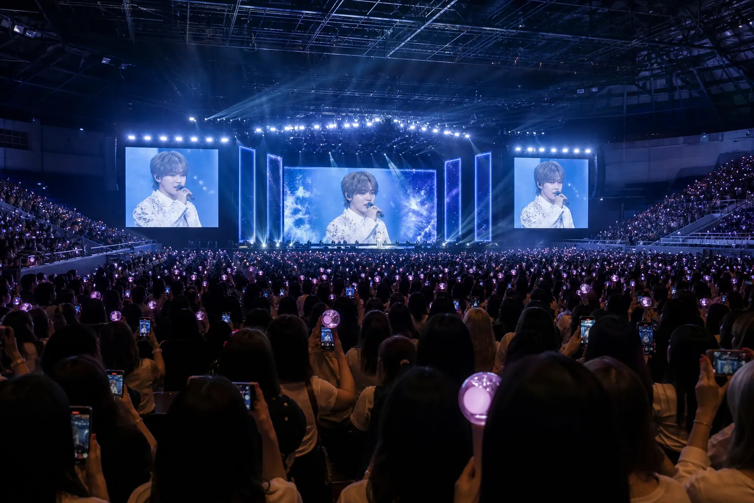 Fans entering a sold-out Asian concert venue for a K-pop fan-con tour