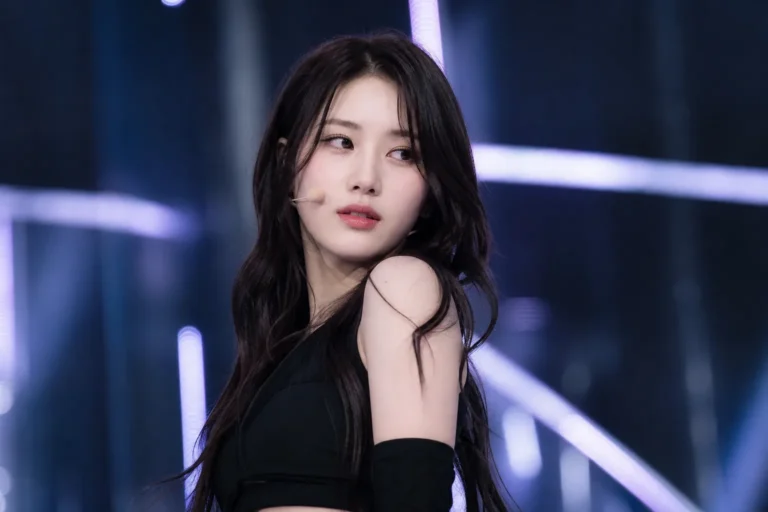 K-pop concert stage representing tripleS YuBin activity pause news