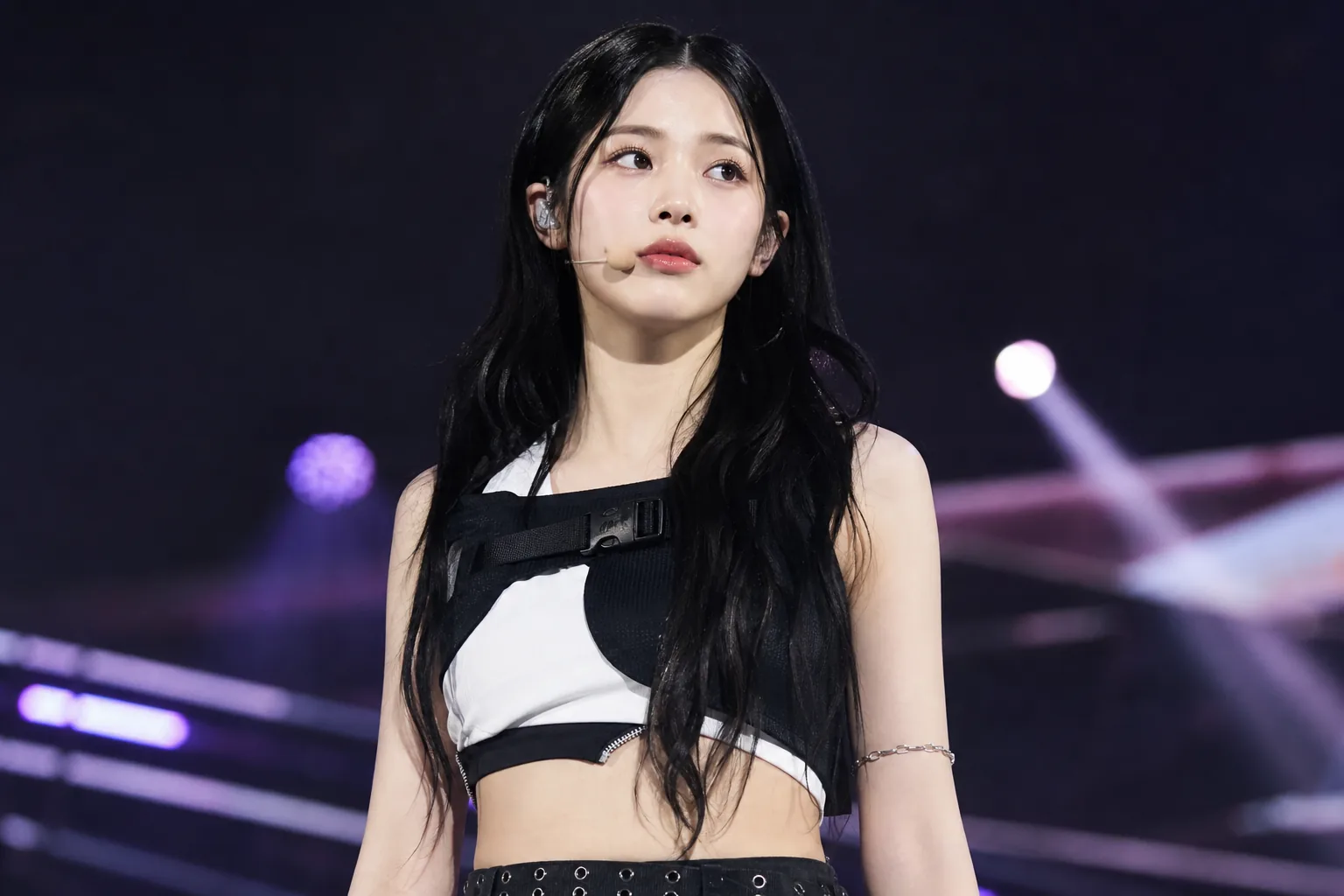 Fan event venue representing adjusted tripleS schedules during YuBin's recovery
