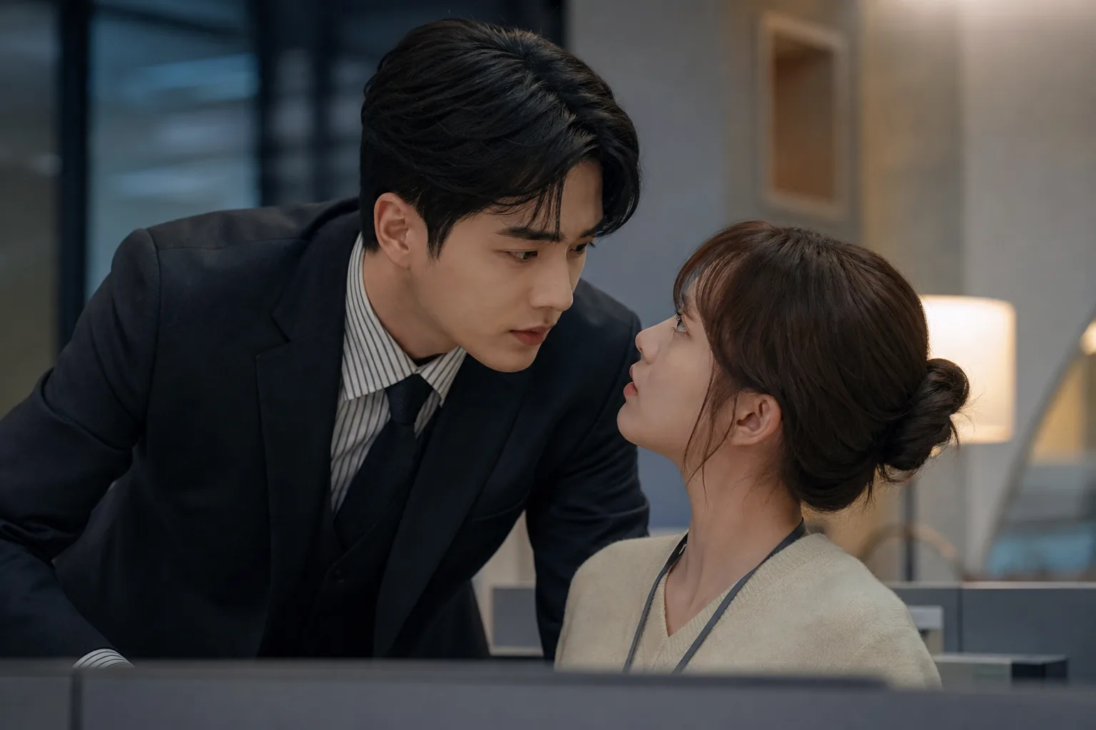 Korean office romance drama mood showing professional distance and emotional tension