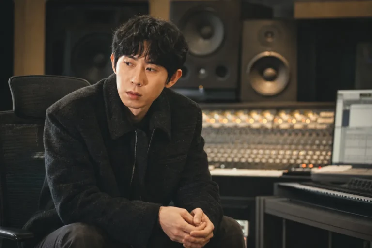 Editorial image of a Korean music producer working in a recording studio after Code Kunst breakup report