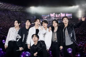 A packed concert crowd representing BTS setting a Billboard Boxscore touring record