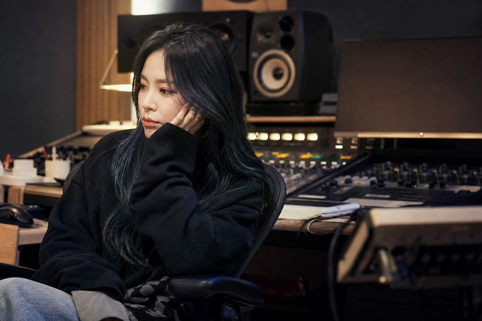 Recording studio scene symbolizing Heize's transition after ending her P NATION contract
