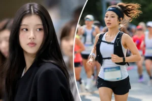 Editorial image of a marathon runner symbolizing Danielle's public appearance amid ADOR lawsuit coverage