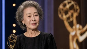 Elegant awards stage representing Youn Yuh-jung Emmy nomination for Beef Season 2