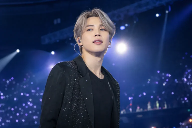 Bright concert stage representing BTS Jimin's global K-pop fan vote win