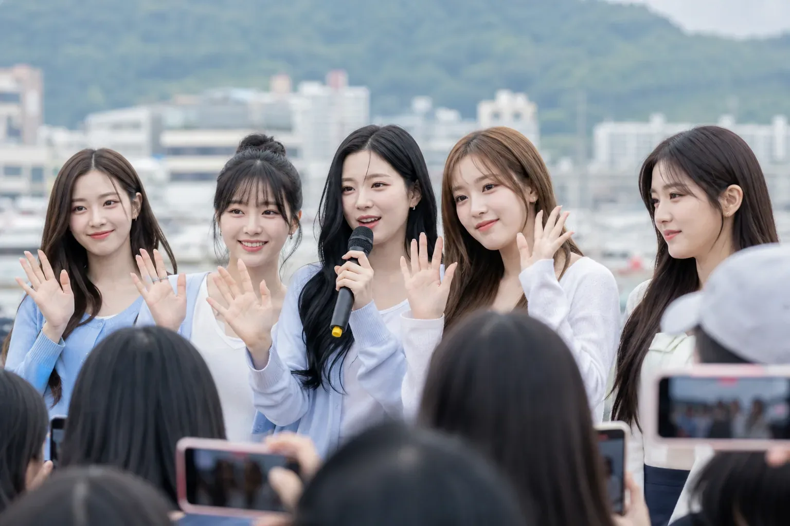 K-pop rookie group returning to a hometown event with fans
