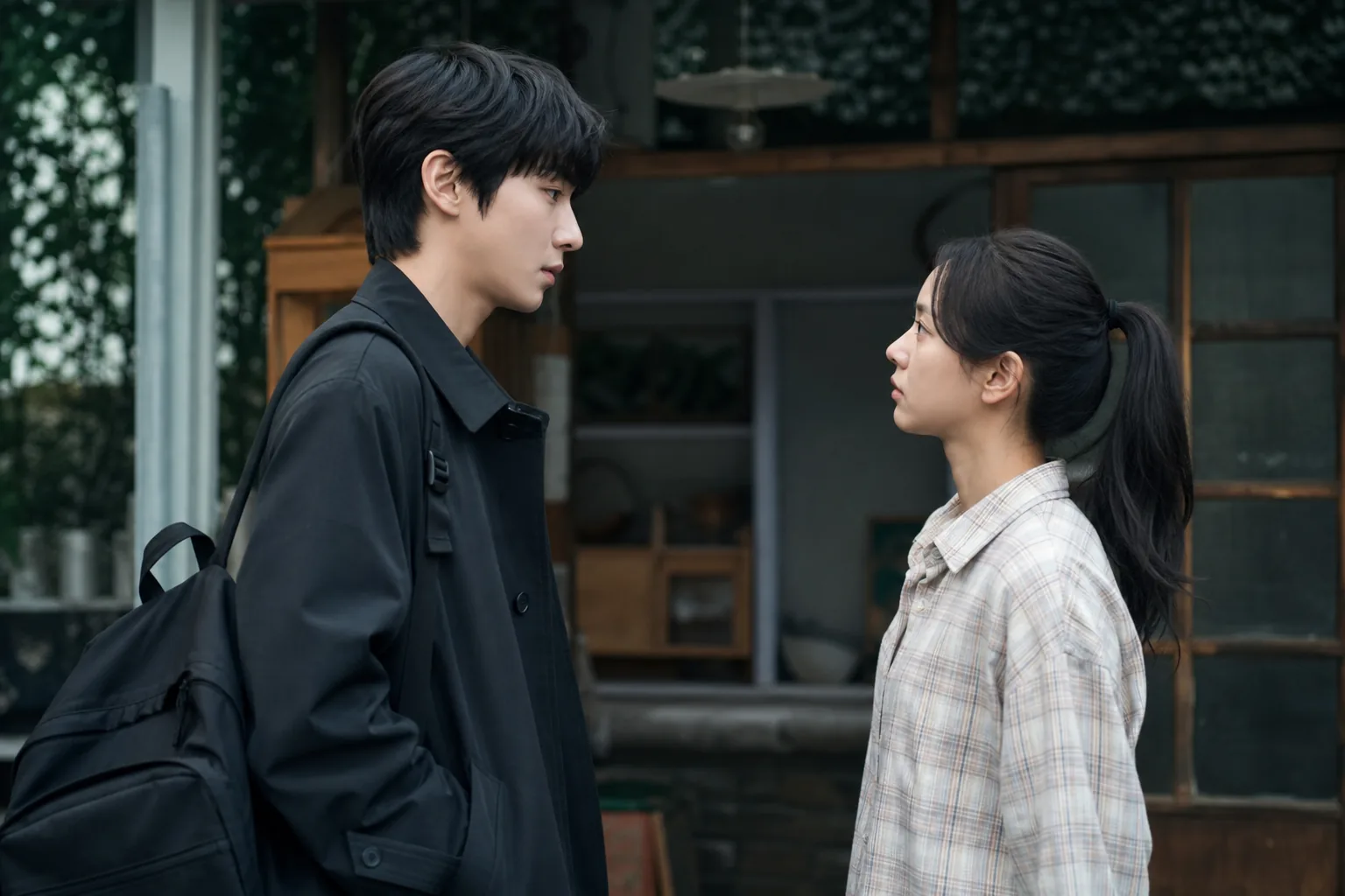 K-drama reunion romance rain umbrella scene concept