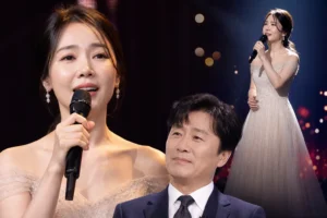 Editorial image of a Korean TV singing stage inspired by Choi Sung-kuk's wife performance story