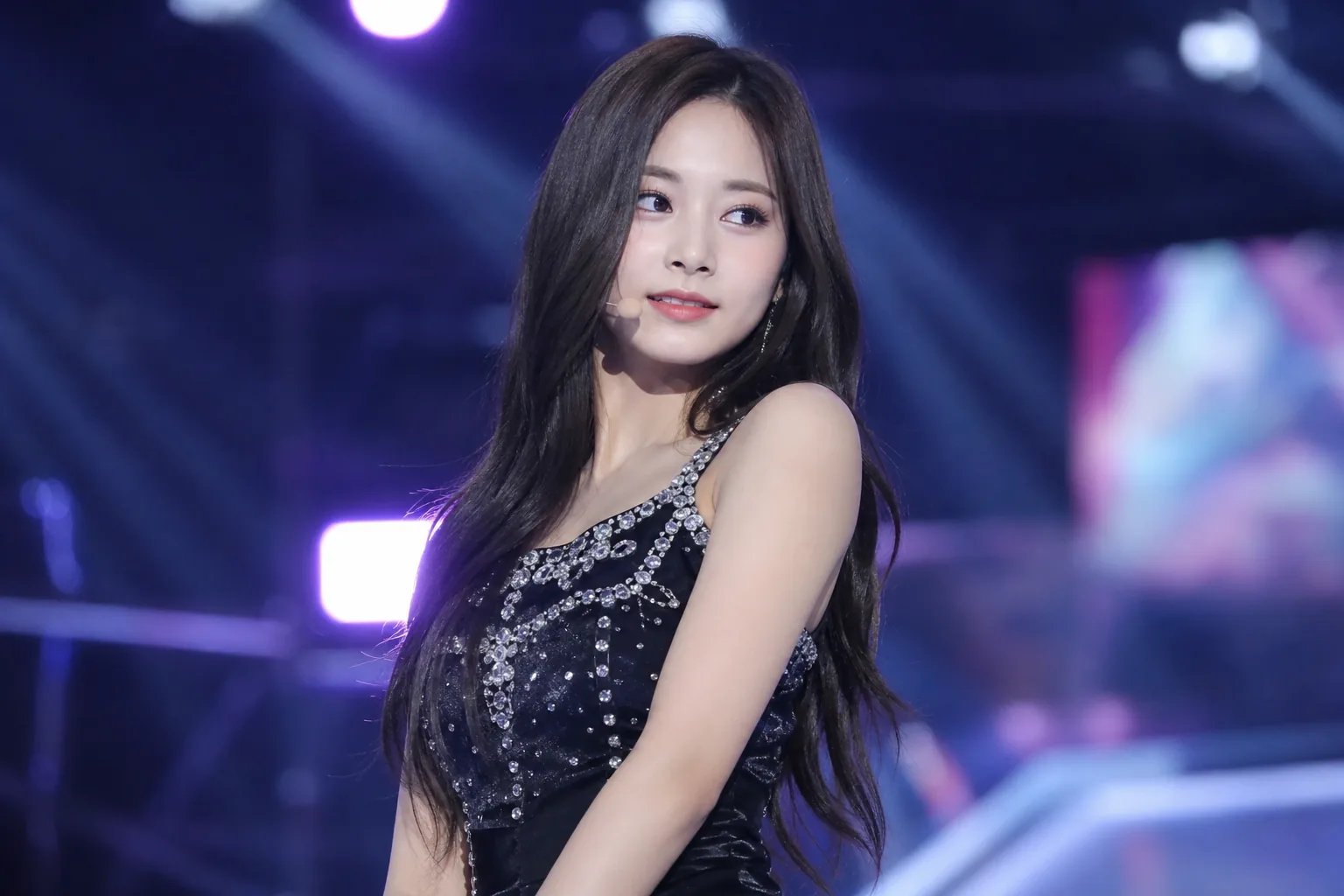 Tzuyu solo career possibilities and TWICE group activities illustrated with a global stage concept