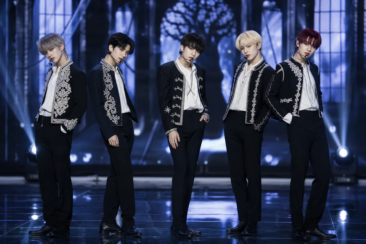 Editorial image of a K-pop video milestone dashboard and stage lighting