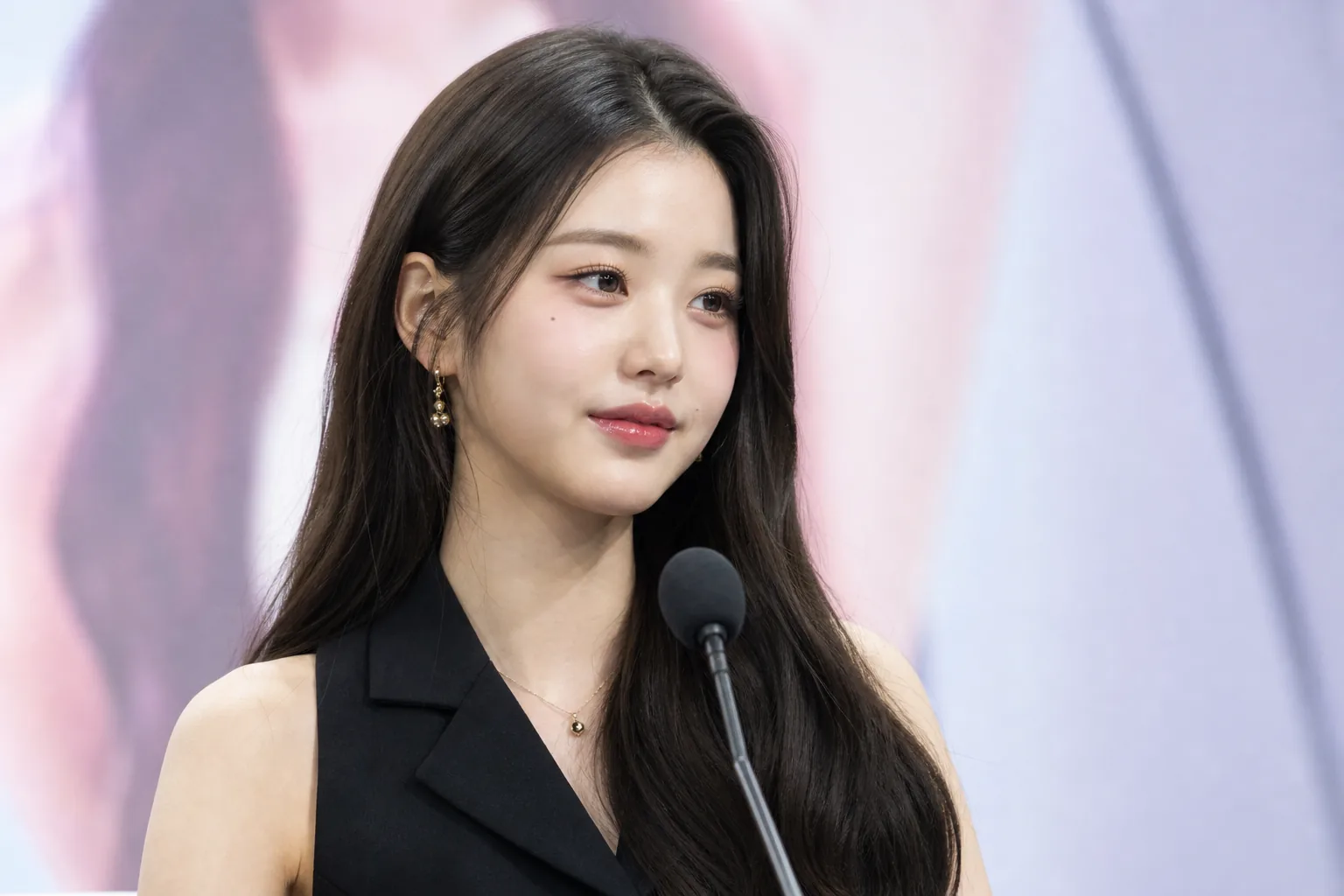 K-pop performer balancing fame criticism and optimism