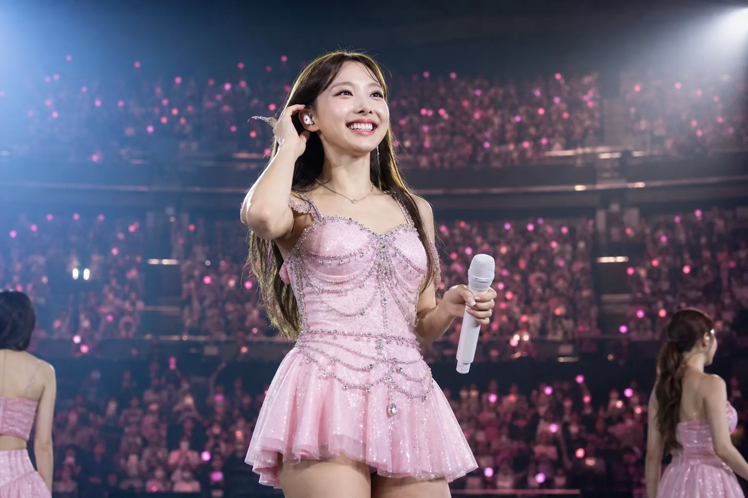 TWICE members closing a tour while fans await contract renewal updates