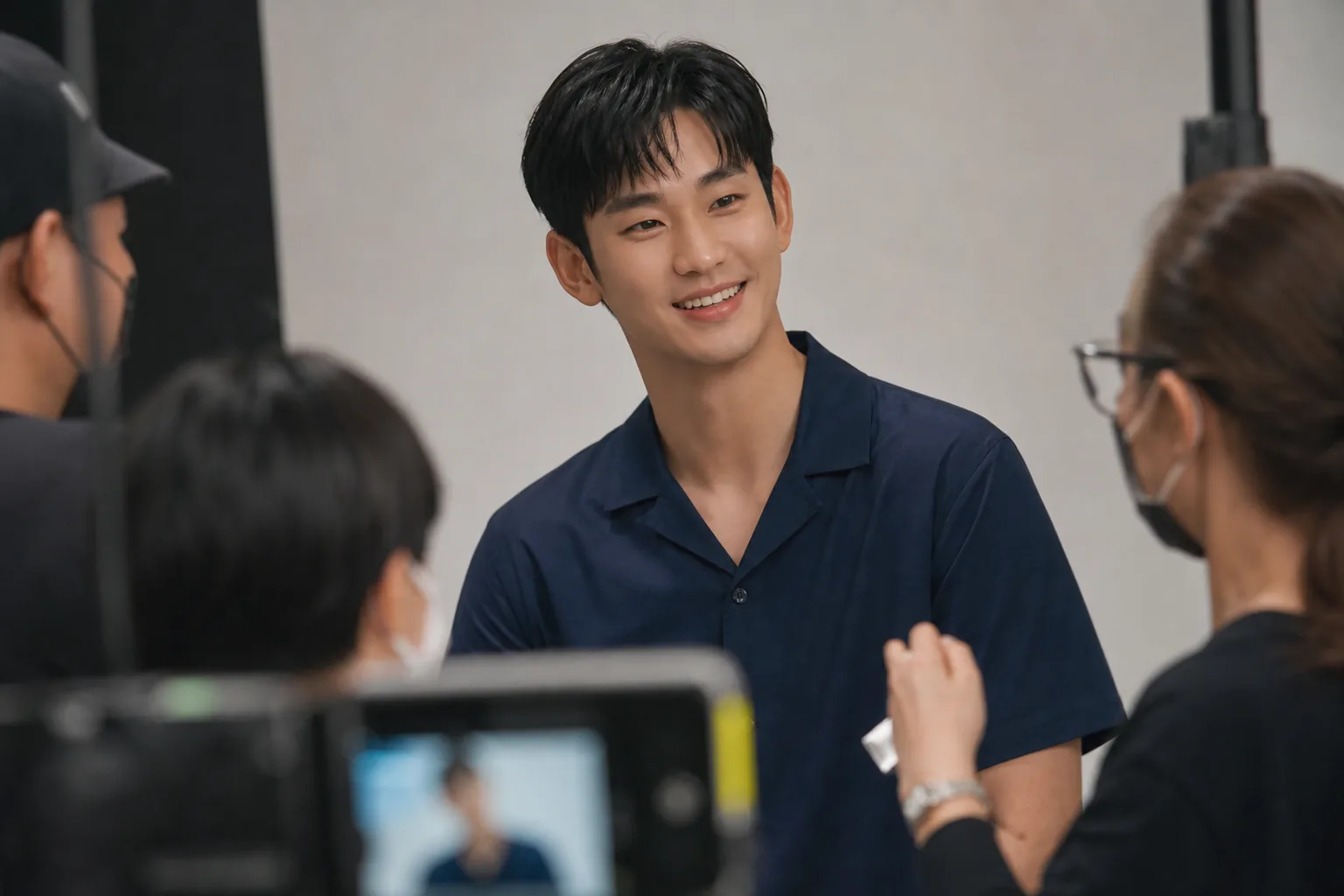 Studio campaign setting representing a Korean actor returning to public promotions