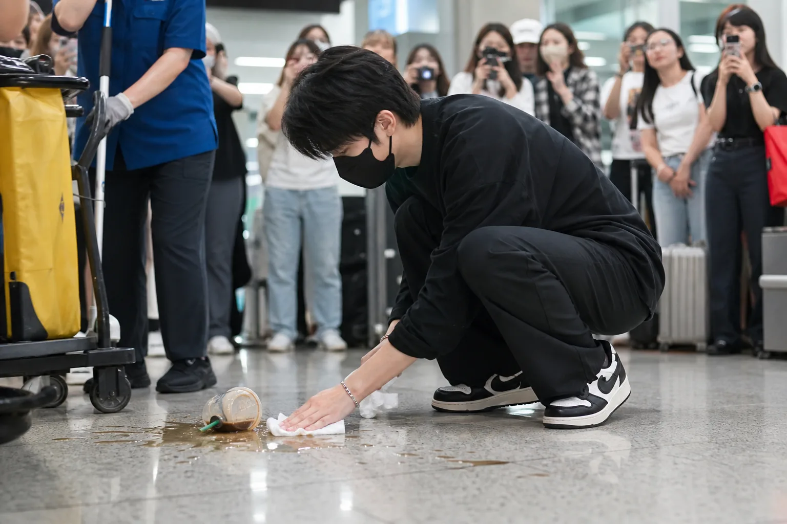 Airport gate scene illustrating idol privacy concerns during travel