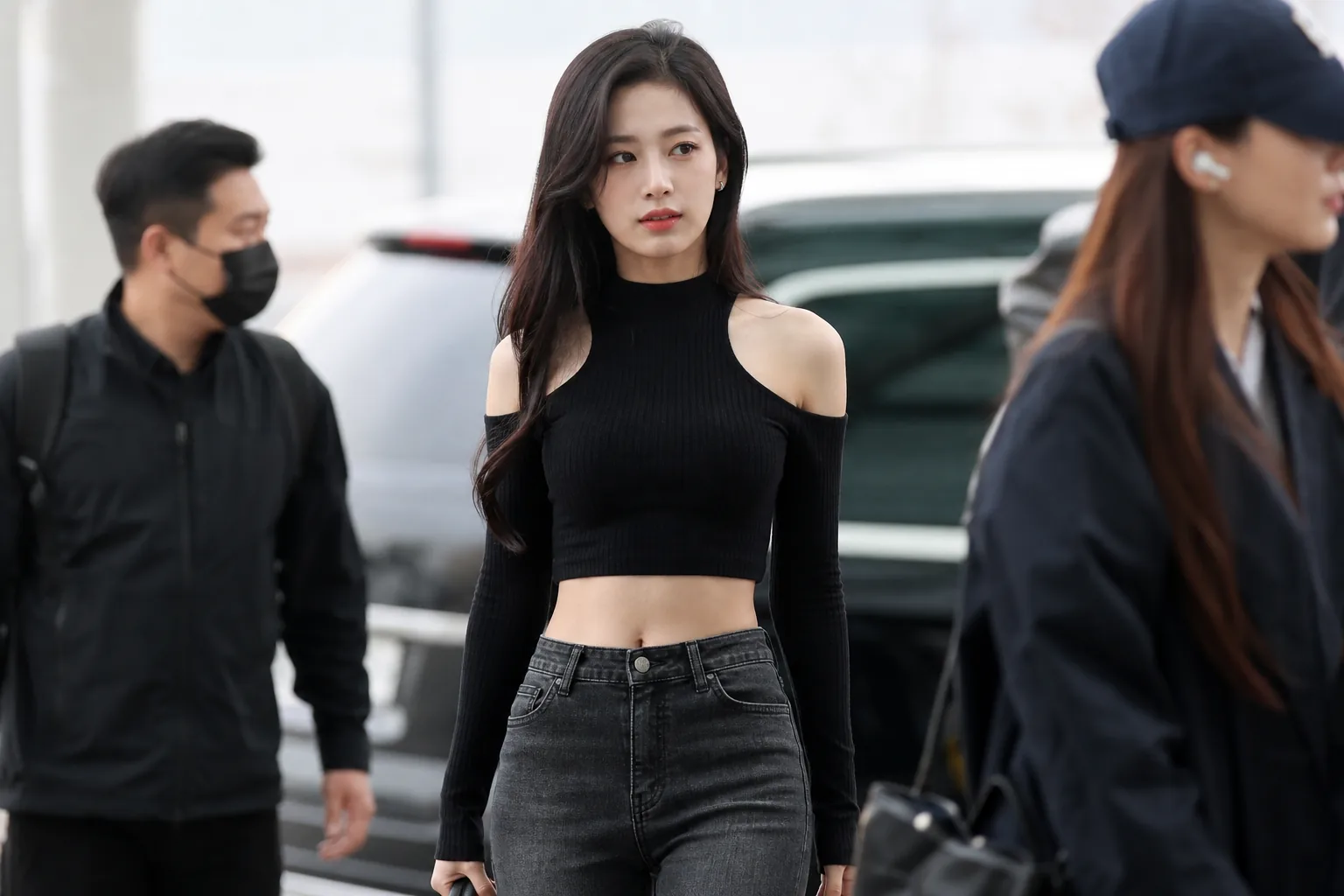 Airport terminal scene representing K-pop idol fashion photos spreading online
