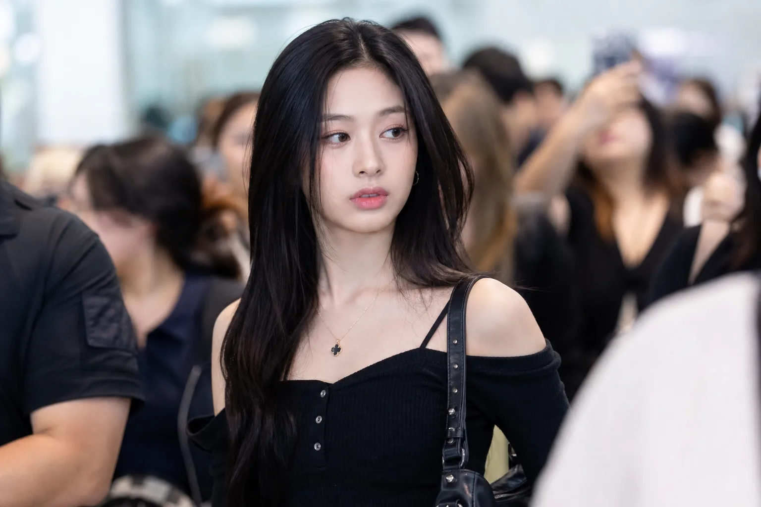 Social media feeds and newsroom desk representing discussion of K-pop idol body scrutiny