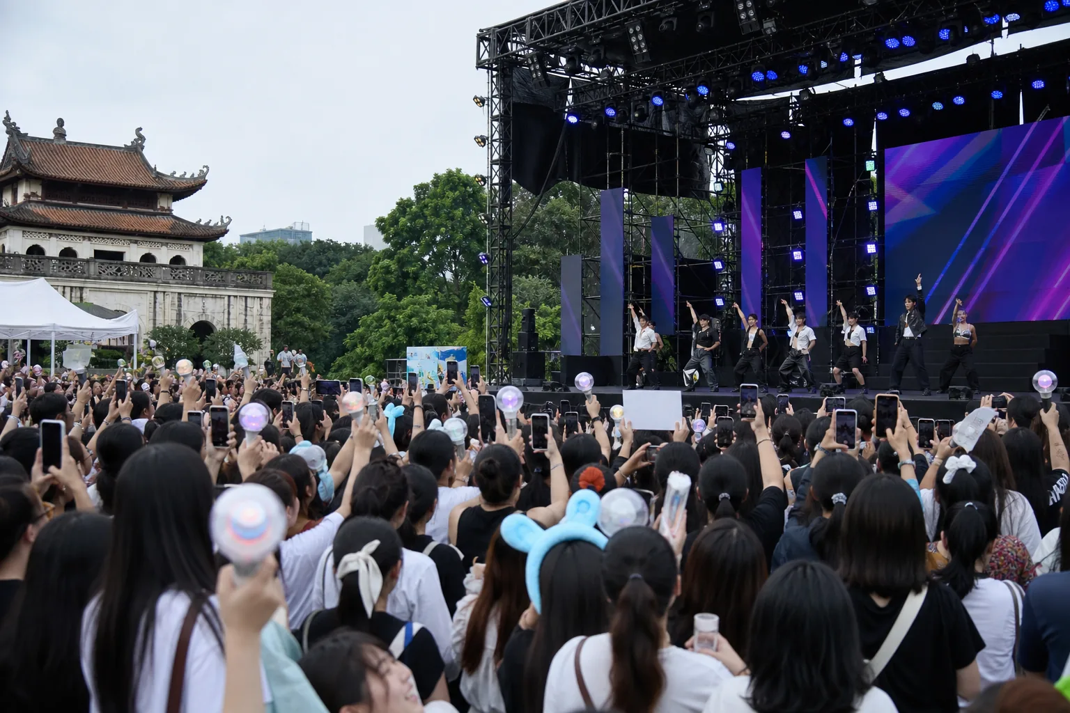 K-pop cover dance performers rehearsing for an international cultural festival