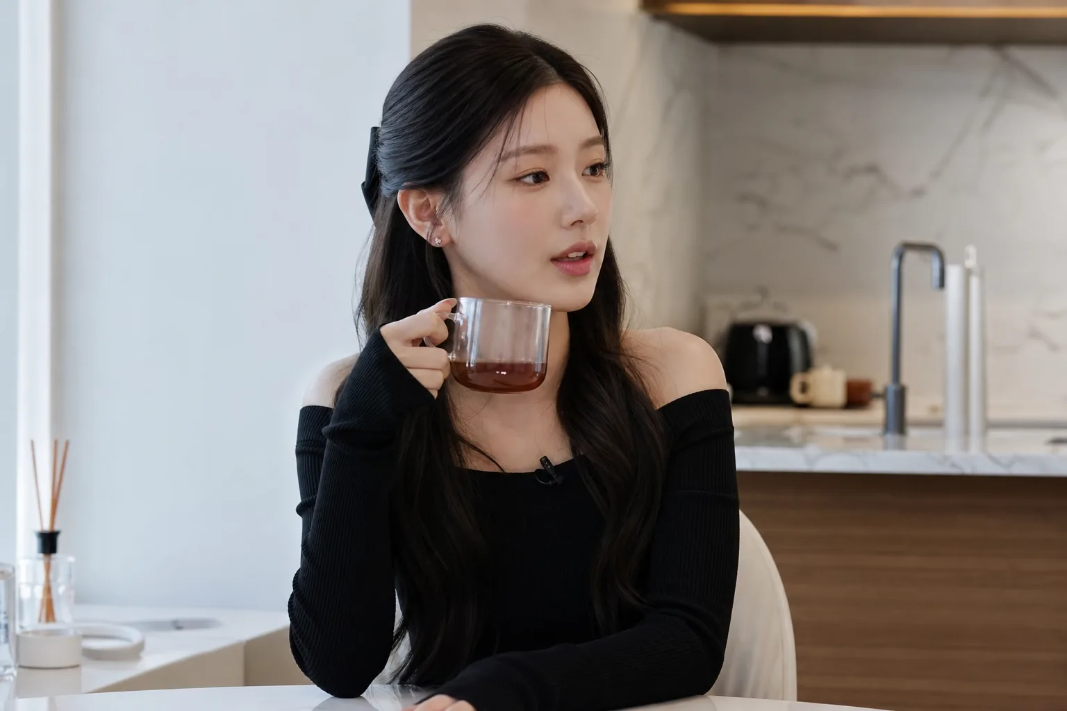 Beauty tools and tea used in a Korean idol morning self-care routine