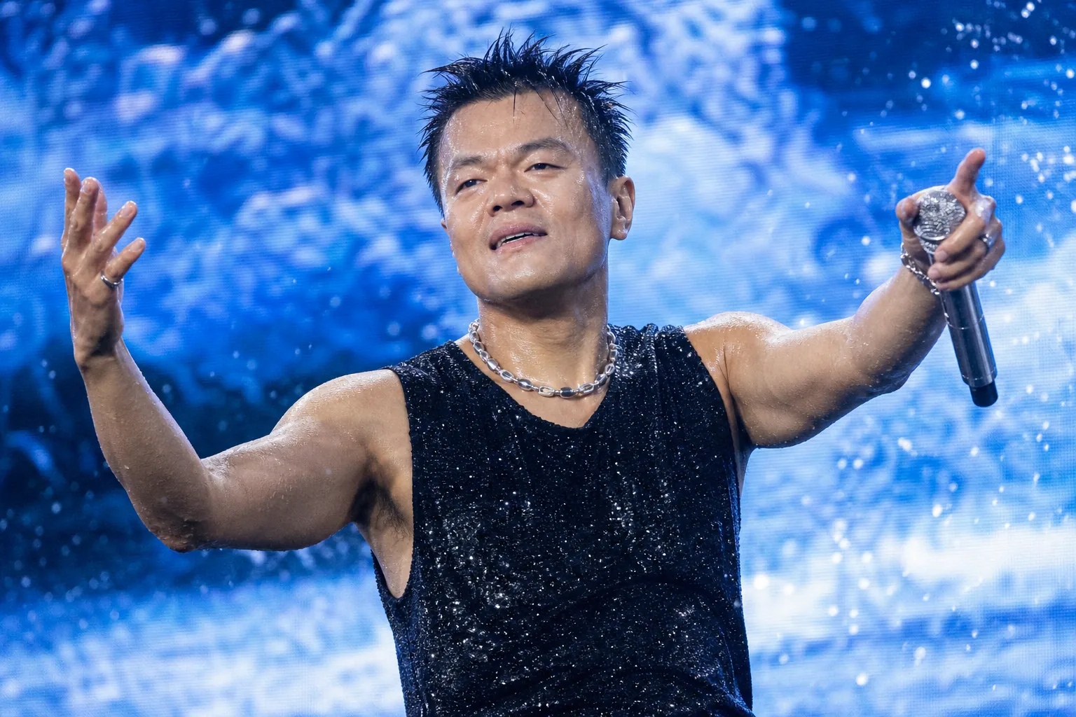 K-pop veteran artist preparing an energetic festival performance