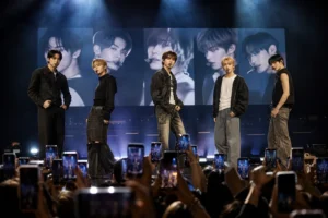 K-pop concert crowd focused on stage as CORTIS launches first tour