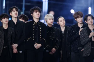 K-pop concert stage representing second-generation idol rivalry and performance pressure