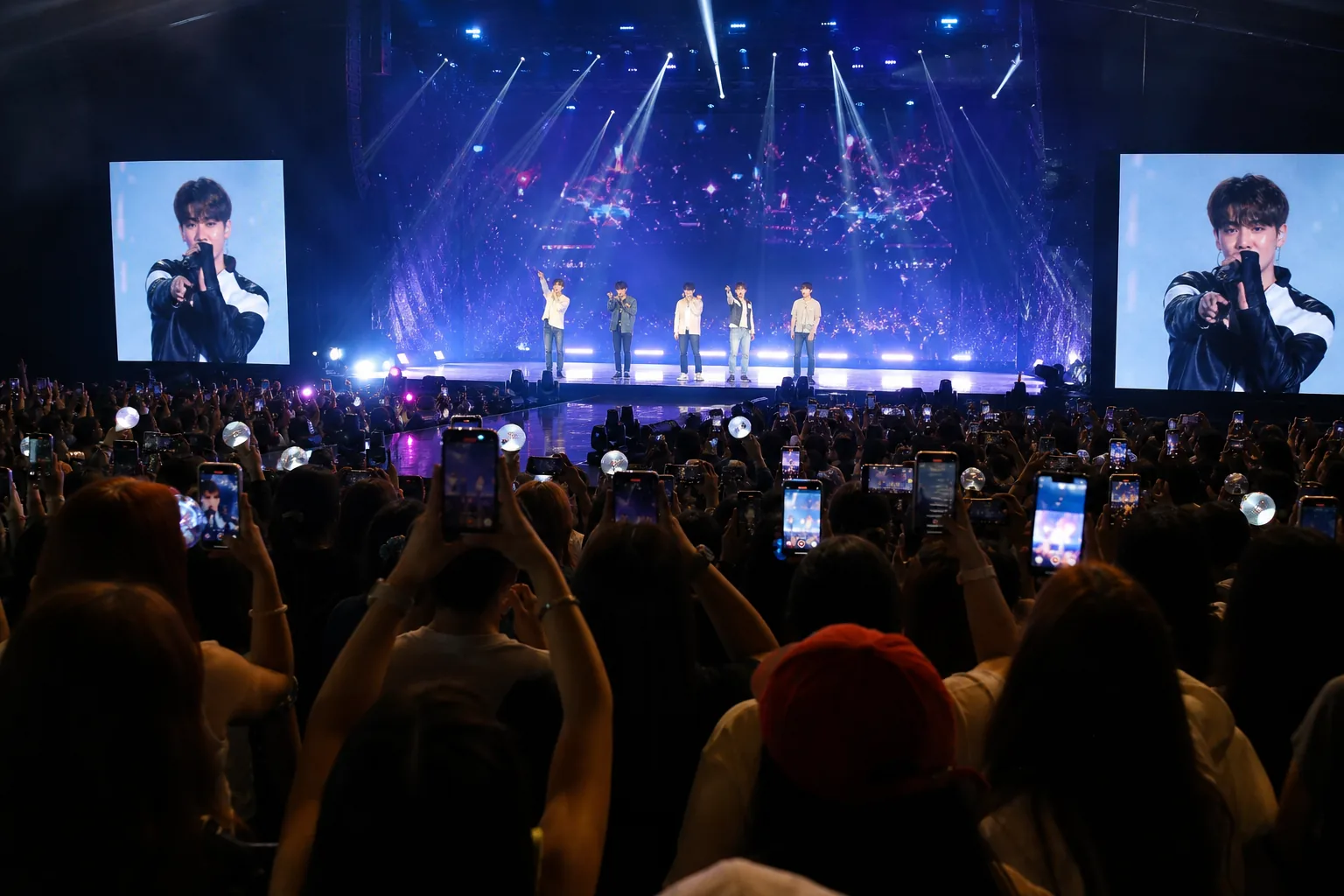 Concert venue audience comparing different CORTIS tour experiences