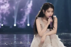 IU album and concert plans postponed amid health concerns