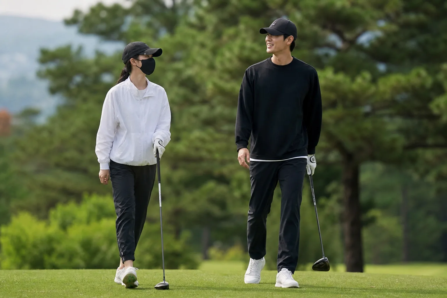 Korean actors walking through a film set and public spotlight