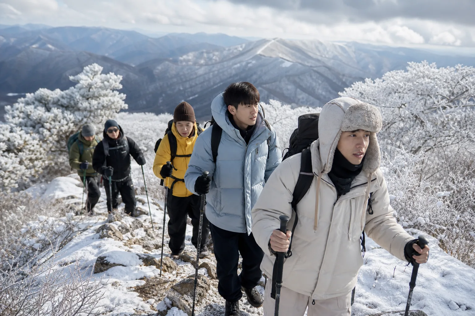 Winter mountain scenery behind a Korean variety show journey