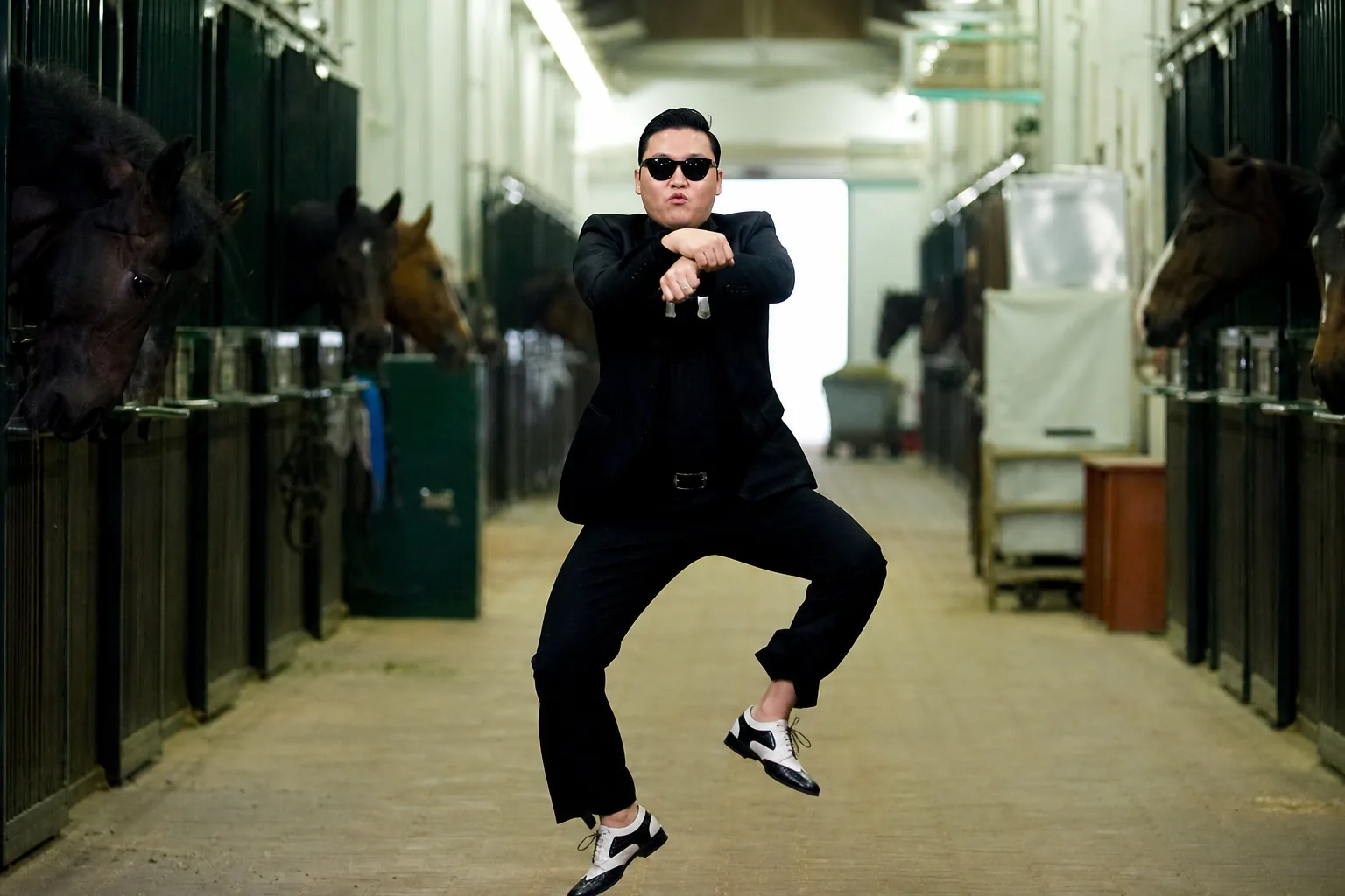 Global K-pop audience celebrating a major YouTube milestone for Gangnam Style