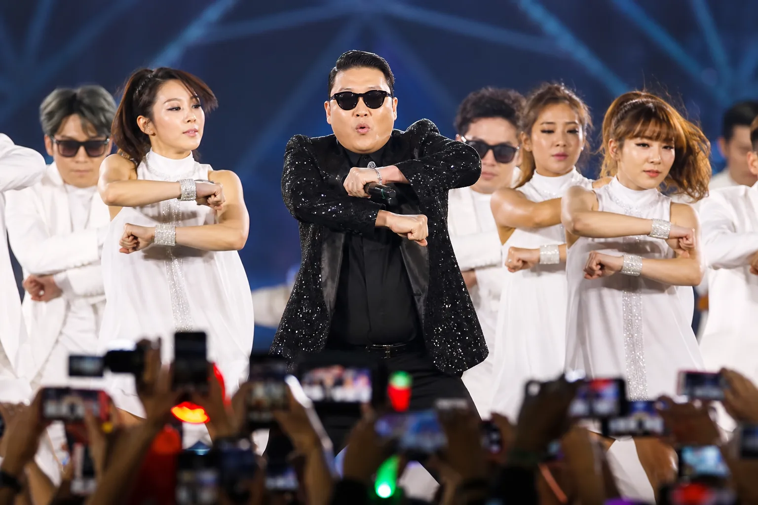 K-pop stage lights representing the lasting legacy of Gangnam Style