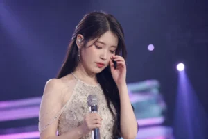 Empty concert stage representing IU postponing her September concert and album release