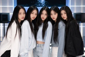Minimal studio setting representing NewJeans releasing fourth anniversary content