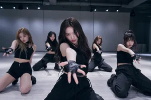 K-pop dance studio scene representing OURBIRTHDAY HUNGRY choreography backlash