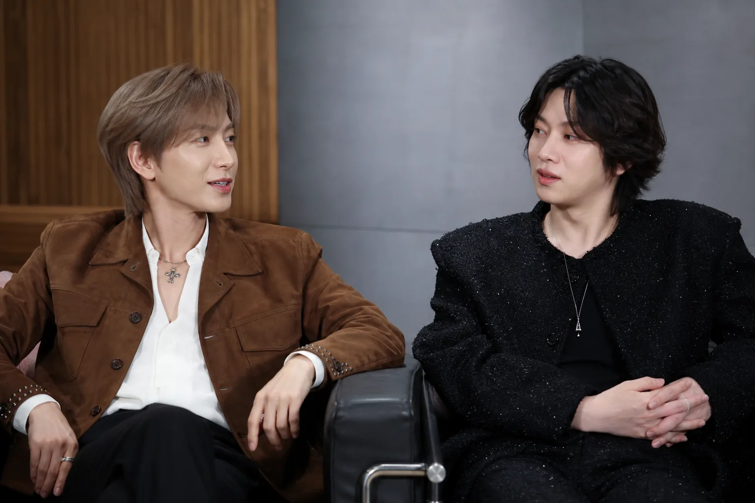 Two contrasting K-pop performers preparing for a unit promotion