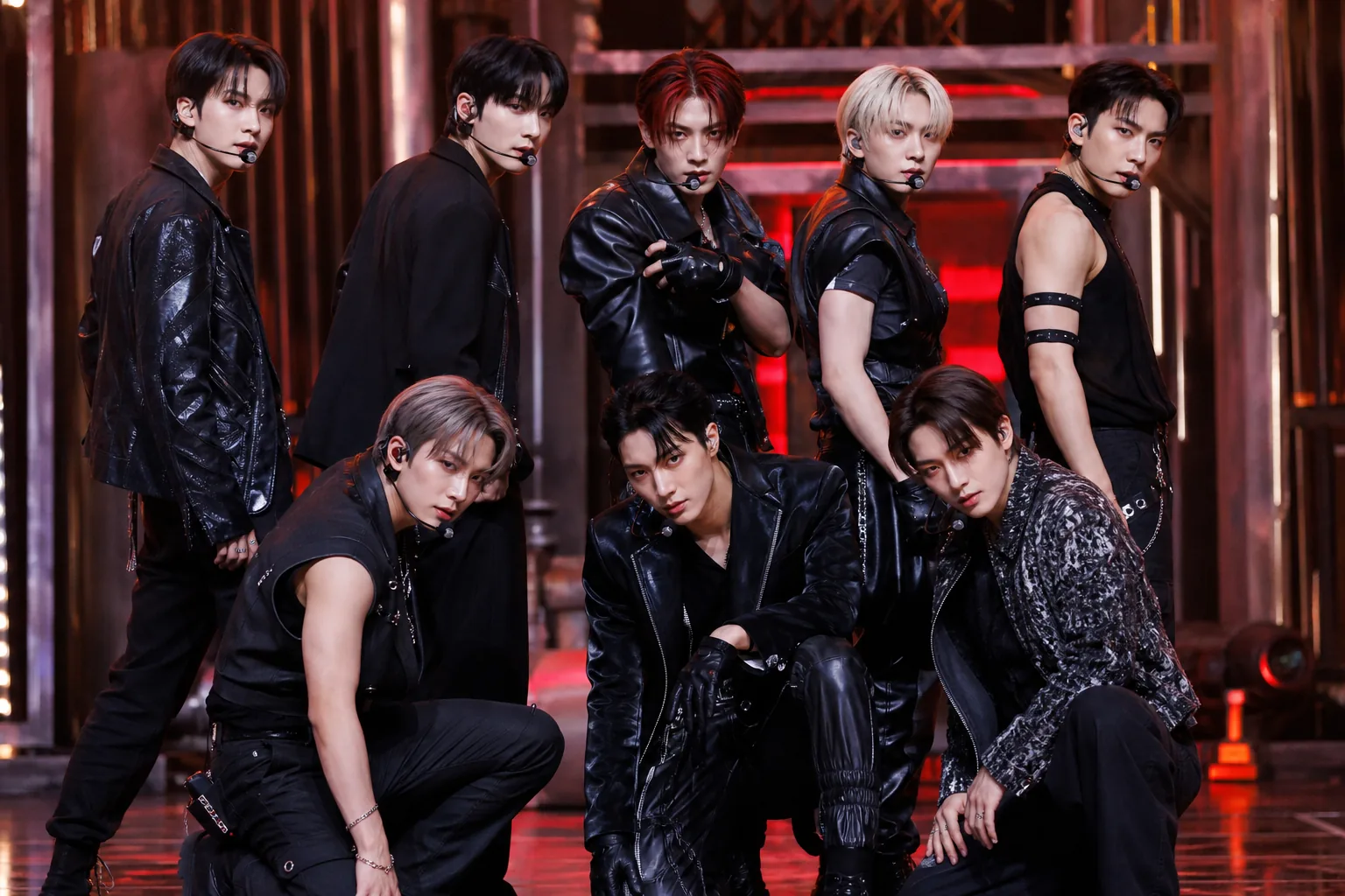 K-pop broadcast performance lineup with bright concert lighting