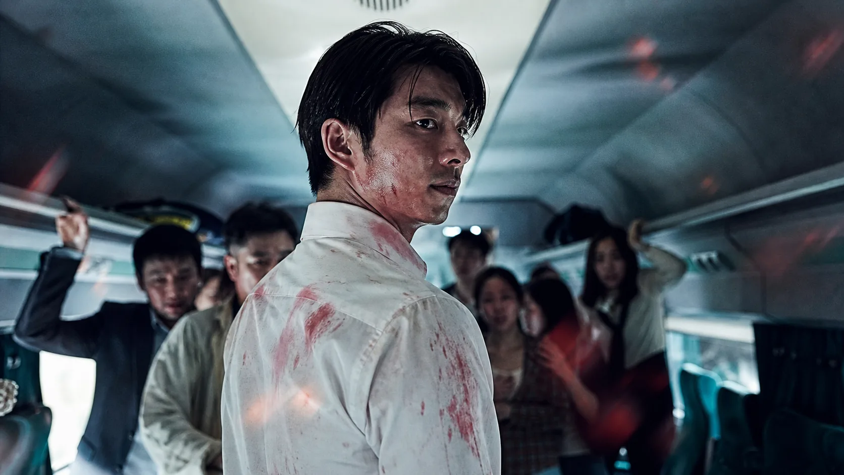 Korean cinema legacy of Train to Busan with tense train and theater imagery