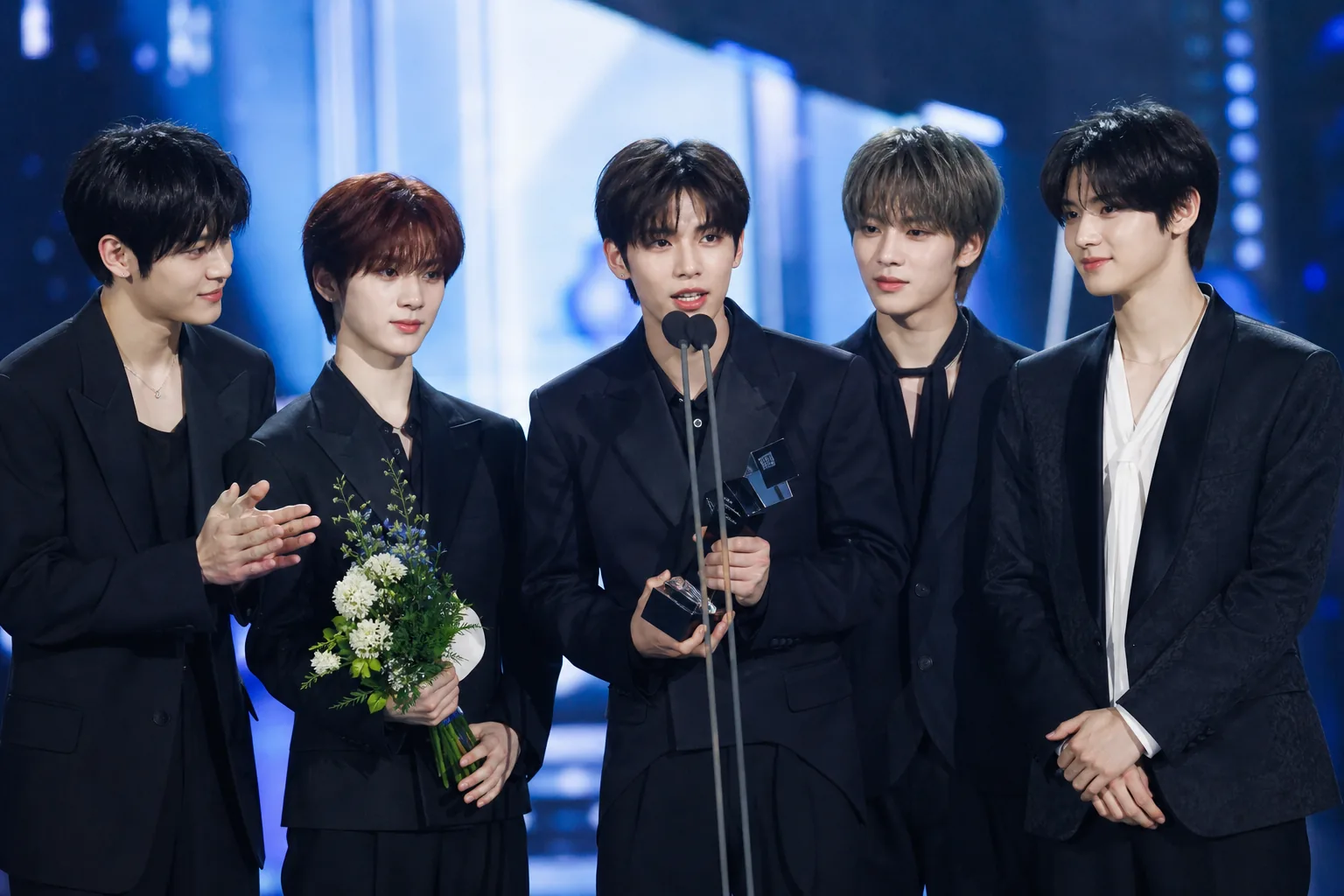 K-pop trophy display representing major KM Chart Awards 2026 winners