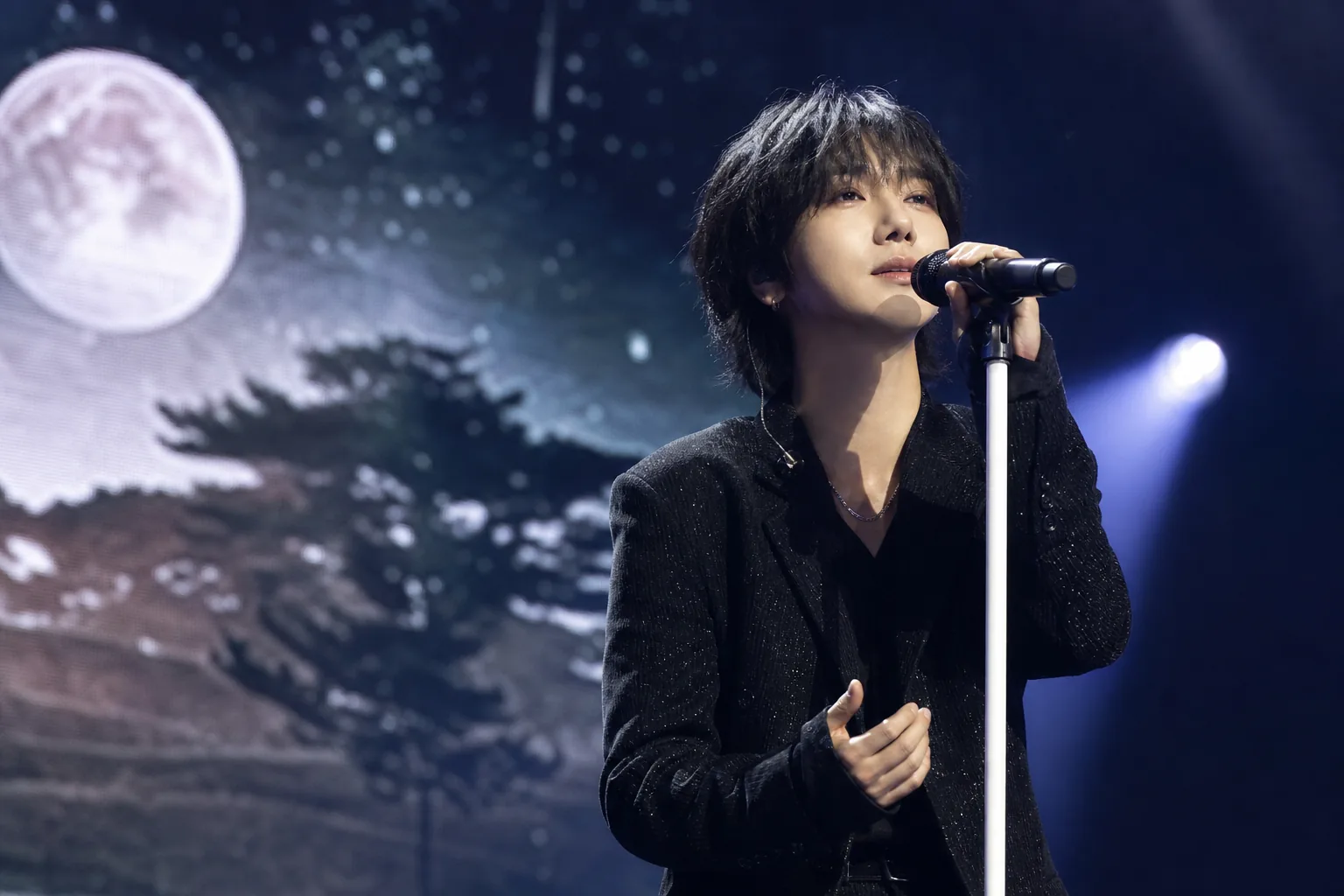 Fans gathering for a K-pop solo concert across Asian cities