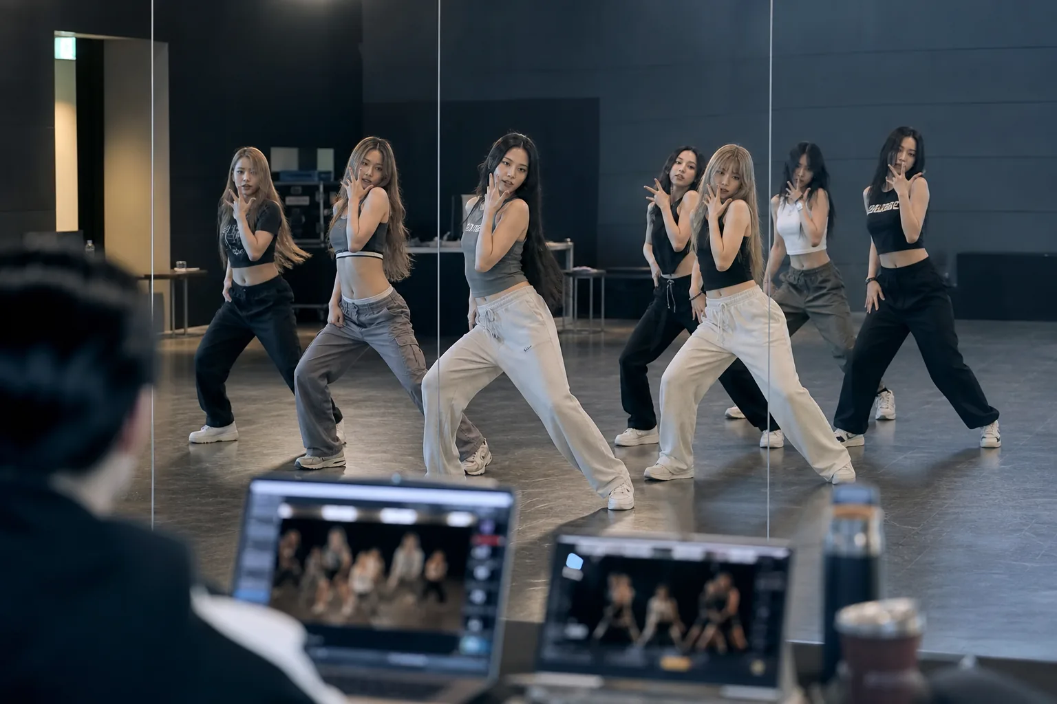 AI visualization of a modern K-pop production workspace and copyright discussion